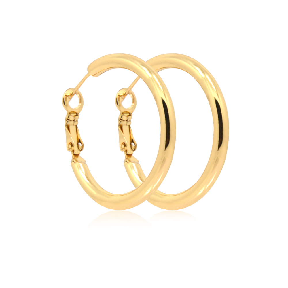 Close-up of the lever back clasp on the gold hoop earrings