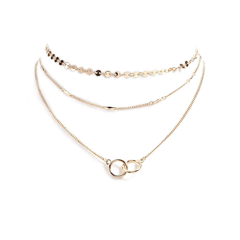 Detailed view of the gold-plated Linked Rings Layering Necklace on a neutral background