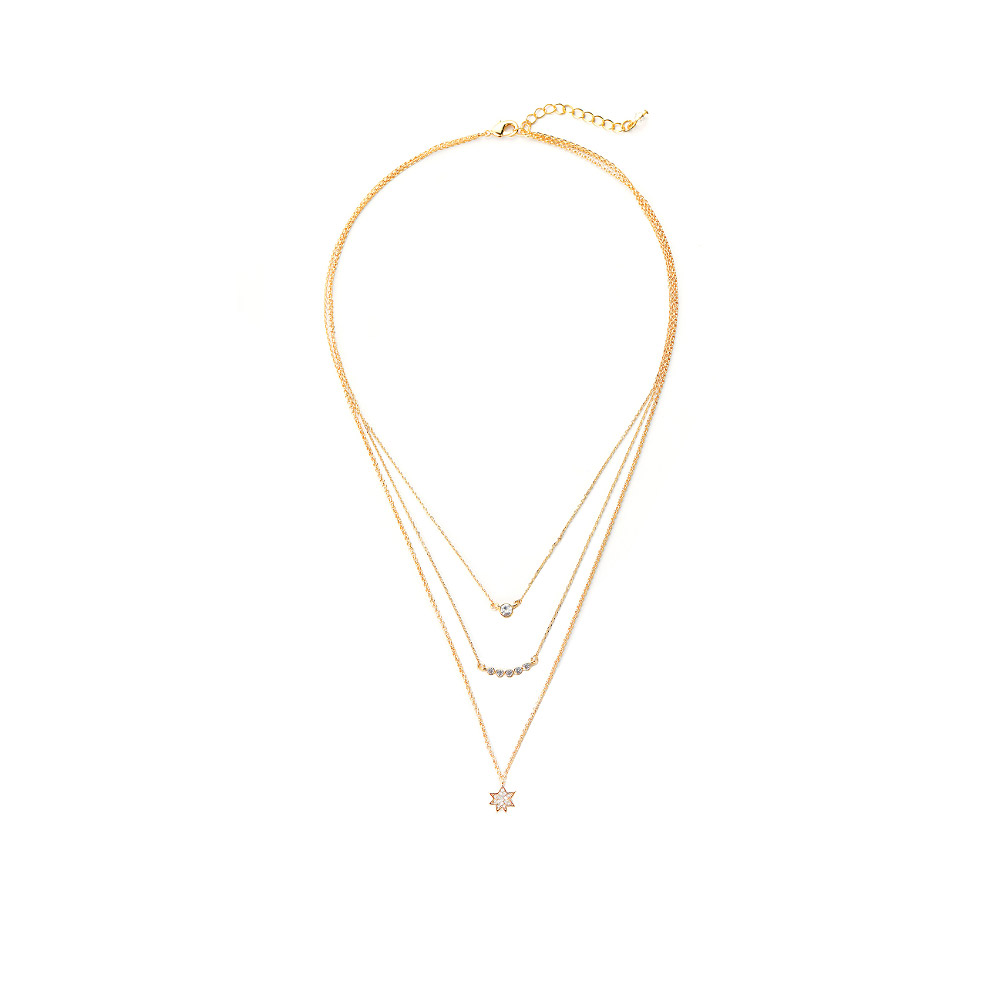 A model wearing the gold multi-layered star pendant necklace
