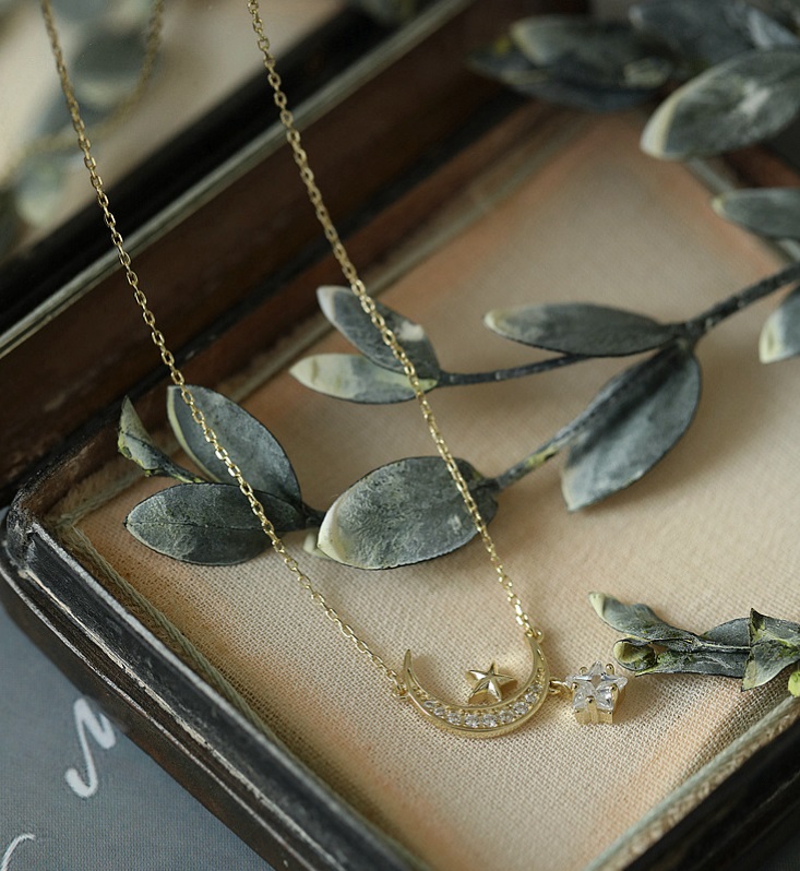 925 Sterling Silver Moon Star Necklace displayed in a wooden box