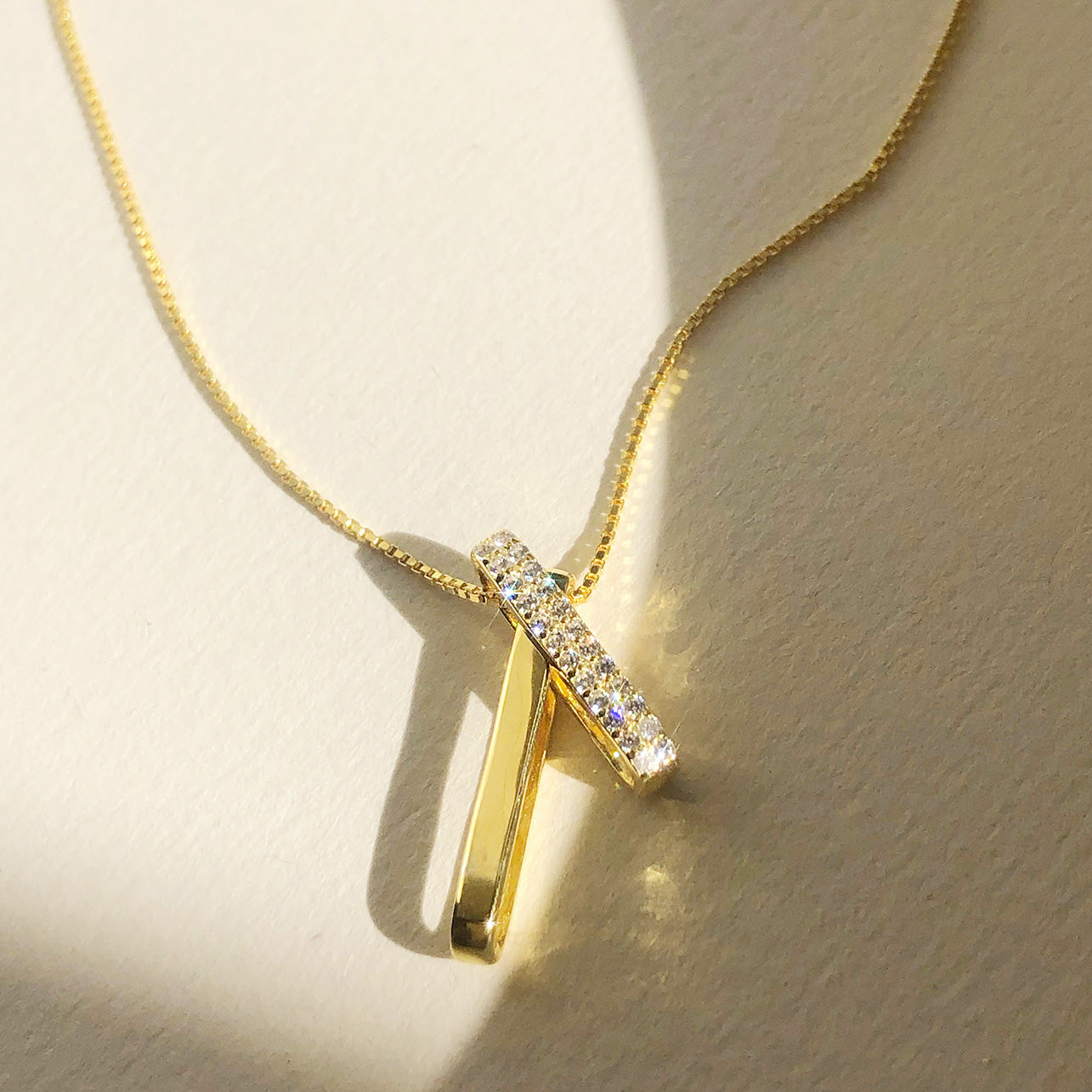 Close-up of the pave CZ stones on the interlocking pendant