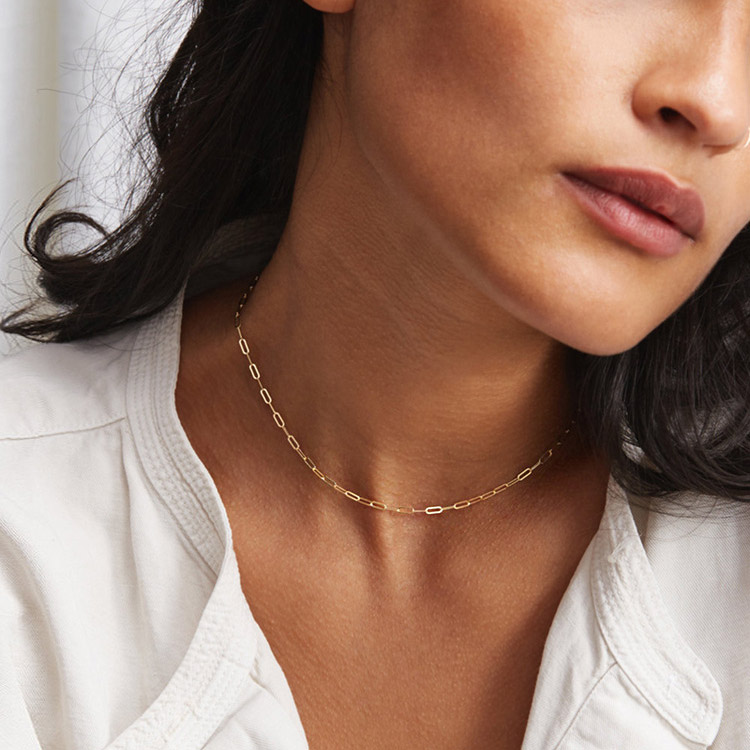 Model showcasing the Gold Plated Stainless Steel Chain Choker