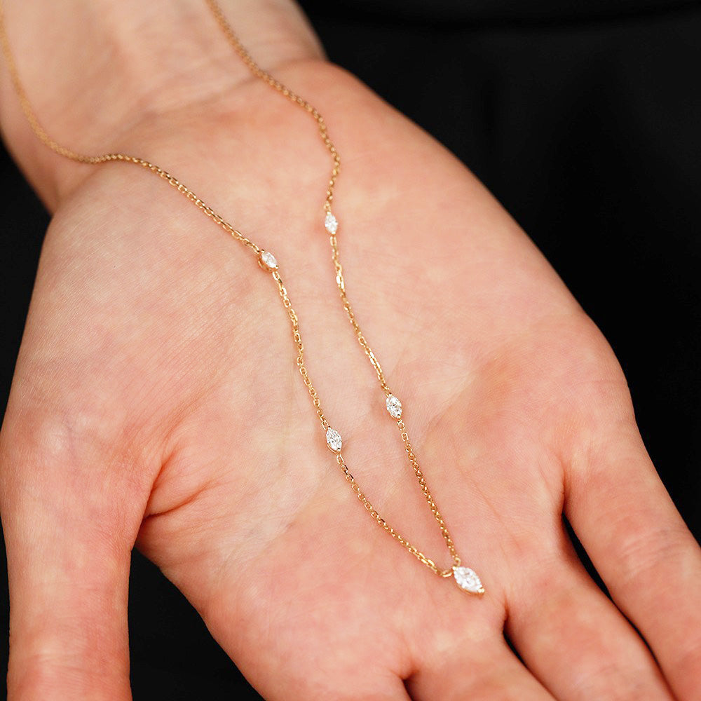 Detailed close-up of the marquise zircon charm on the 925 sterling silver necklace.