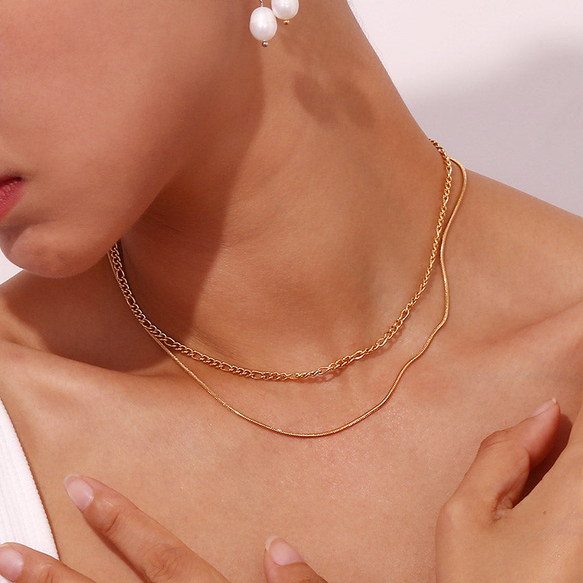 Woman wearing the elegant double layered stainless steel chain necklace