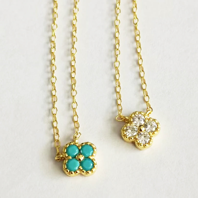 Two variations of the 925 sterling silver petal necklace in gold finish