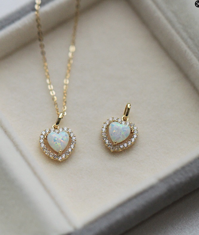 Full jewelry set view of the 925 Sterling Silver Heart Opal Necklace and matching earrings.