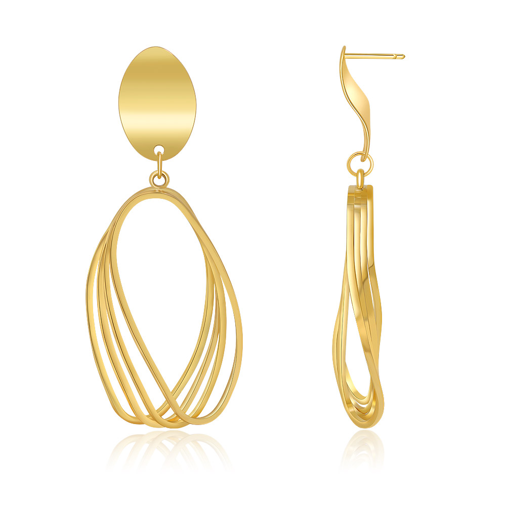 Detailed view of the gold openwork oval earrings craftsmanship