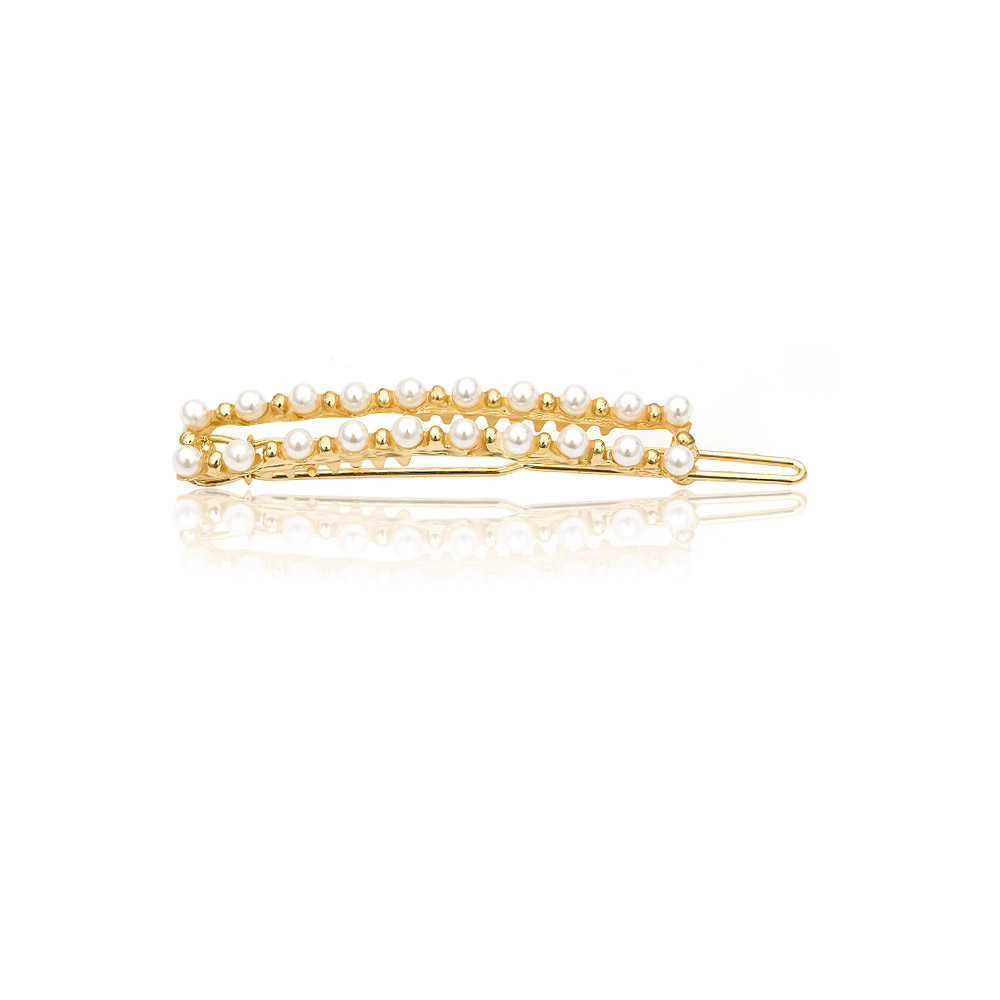 A pair of Double Row Pearl Bobby Pins on a white background