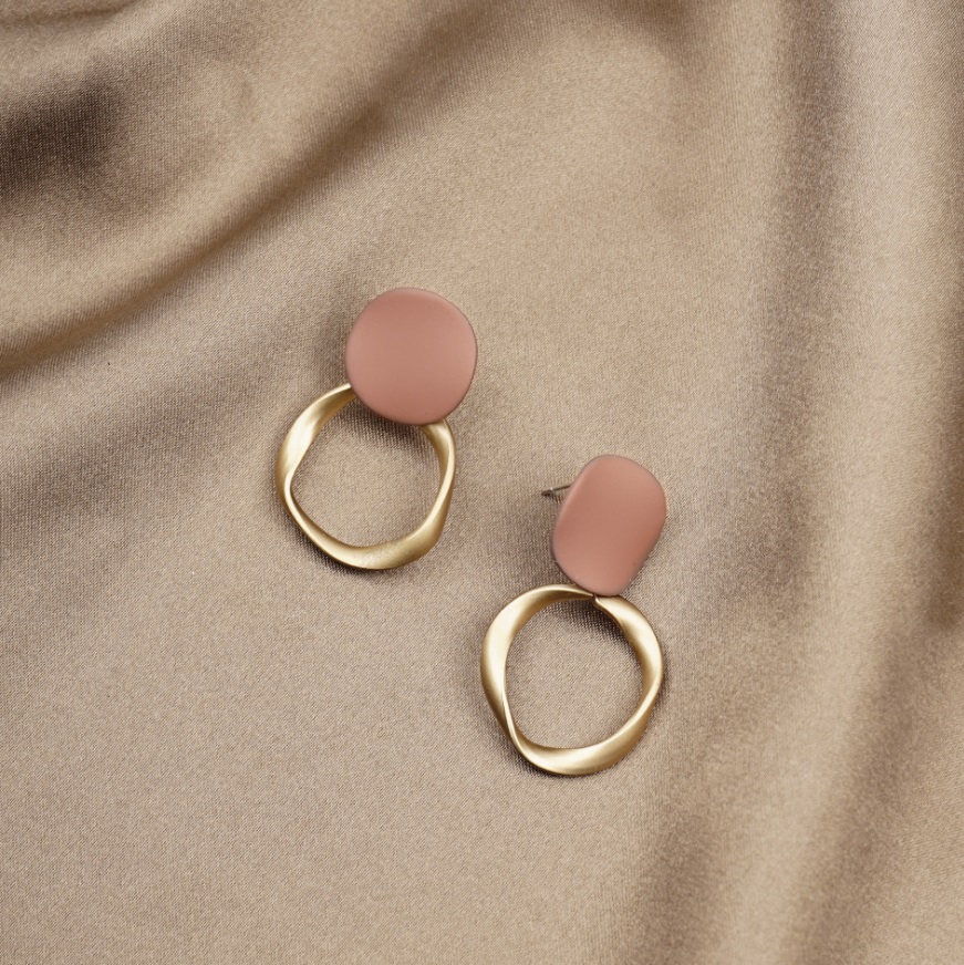 Detailed view of the Pink and Matte Gold Drop Earrings showcasing the matte finish