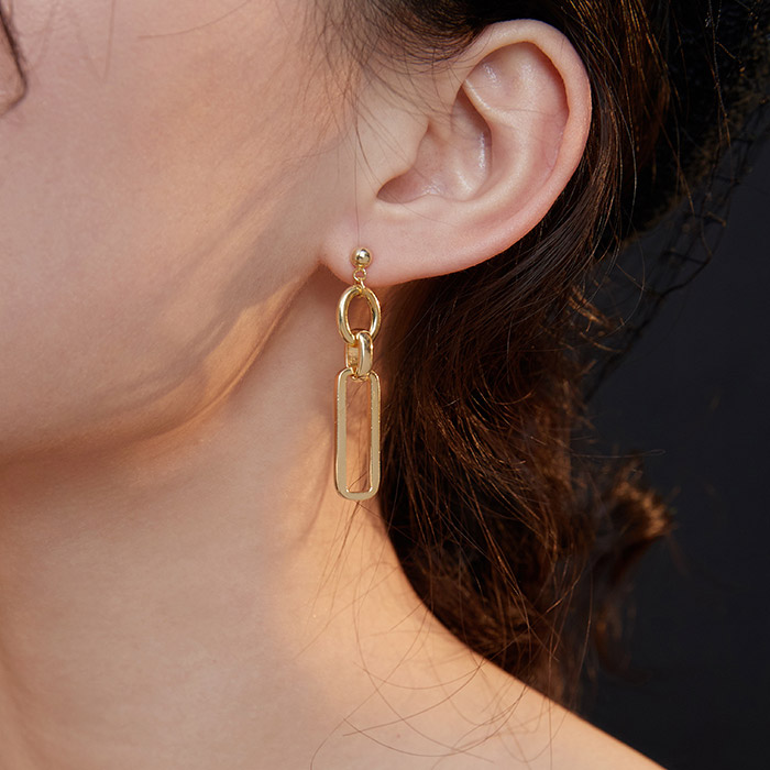 Model showcasing the Gold Filled Link Earrings