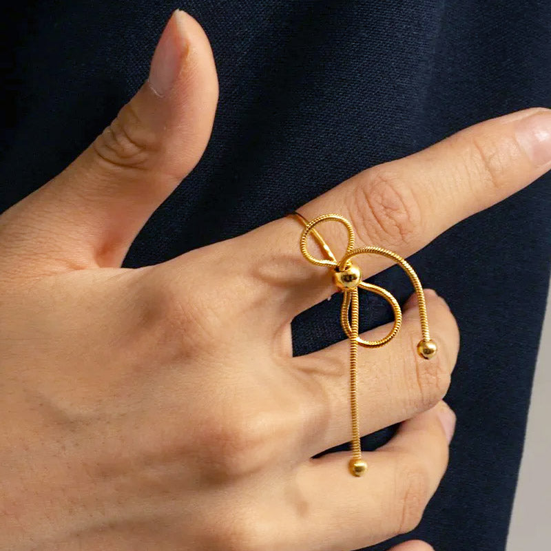 Detailed view of the gold bowknot ring's intricate design