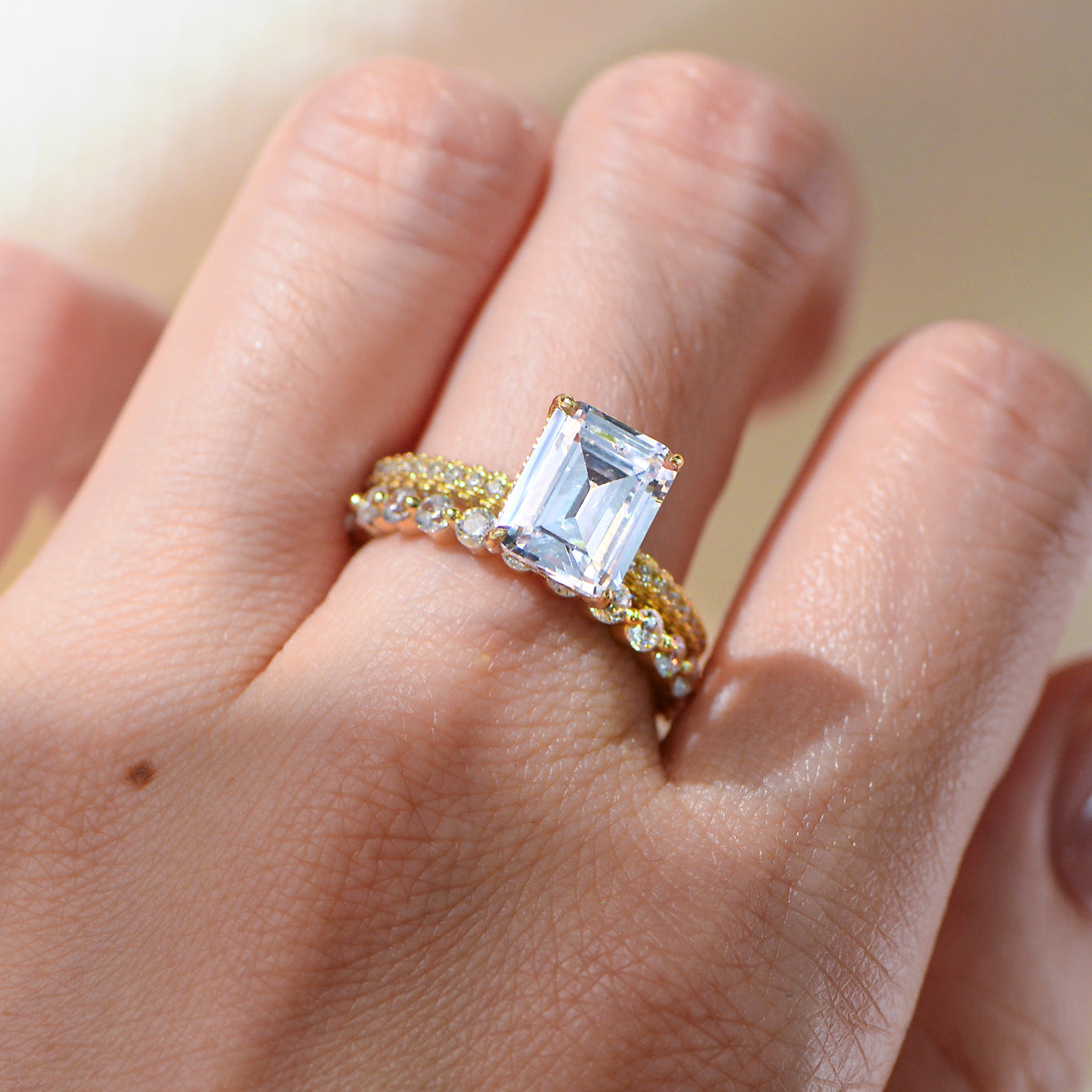 Taylor Swift inspired cushion cut ring worn on a finger