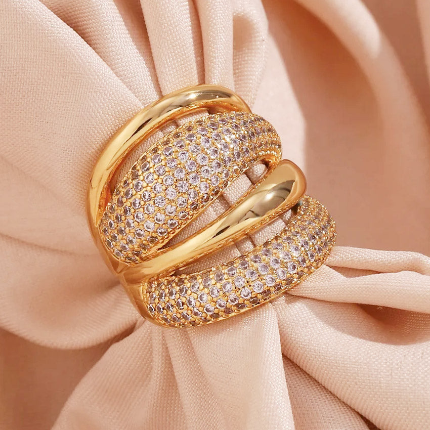 Detailed view of the CZ paved layers on the 18K gold plated dome ring