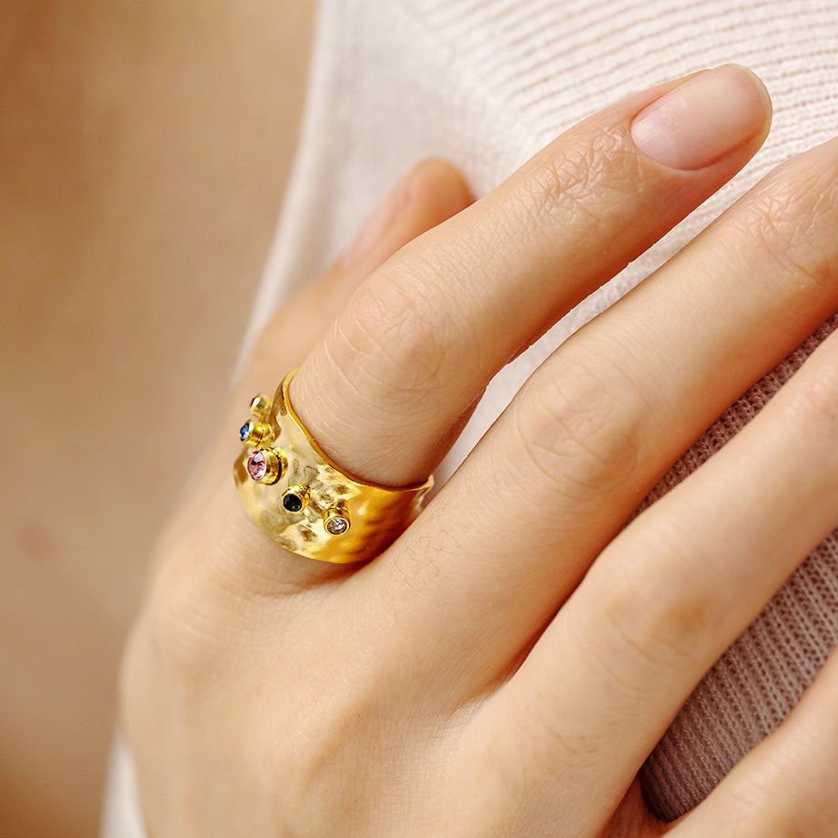 A model wearing the colorful stainless steel cuff ring to showcase its style.