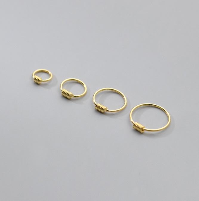 Example of available gold plating finish on coiled rings