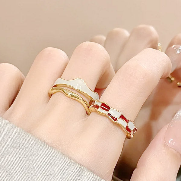 Close-up of the gold-plated enamel checkerboard rings