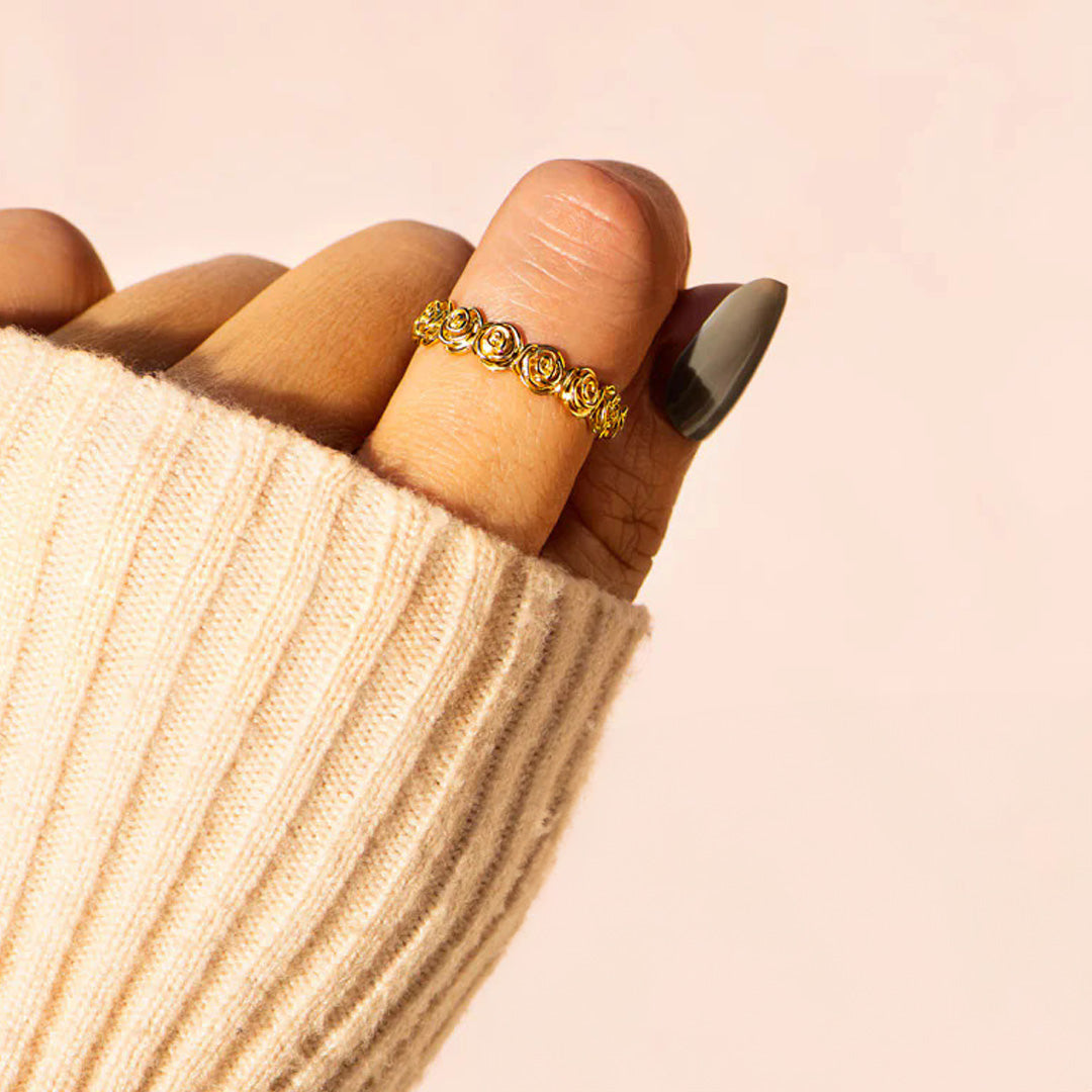 A model showcasing the elegant fit of the Eternal Bloom rose ring.