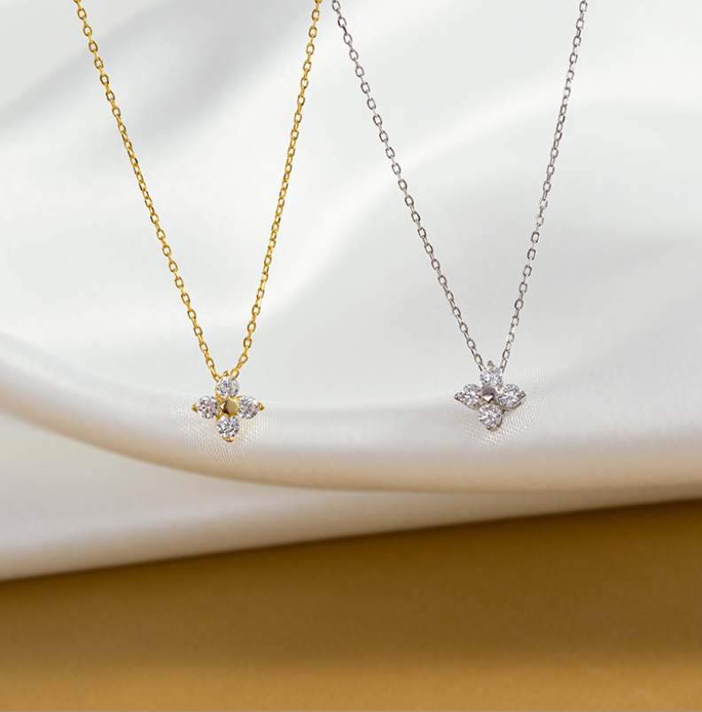 Both gold and silver versions of the 925 Sterling Silver Leaf Clover Necklace