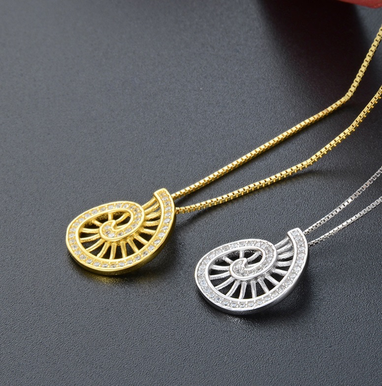 Gold and silver color options for the 925 sterling silver spinning necklace