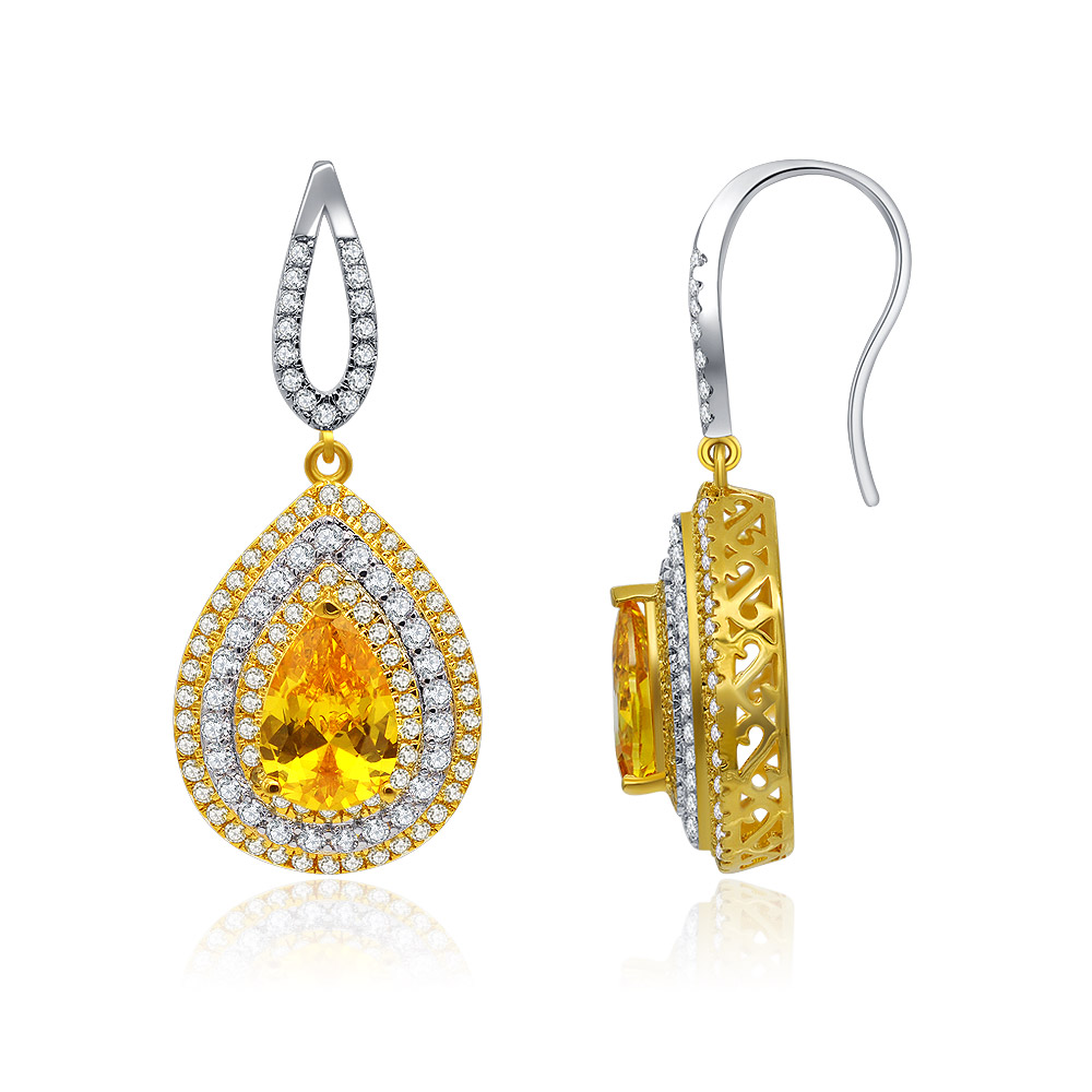 A detailed side view of the Enticing Bright Yellow Topaz Drop Earrings showcasing the two-tone plating.