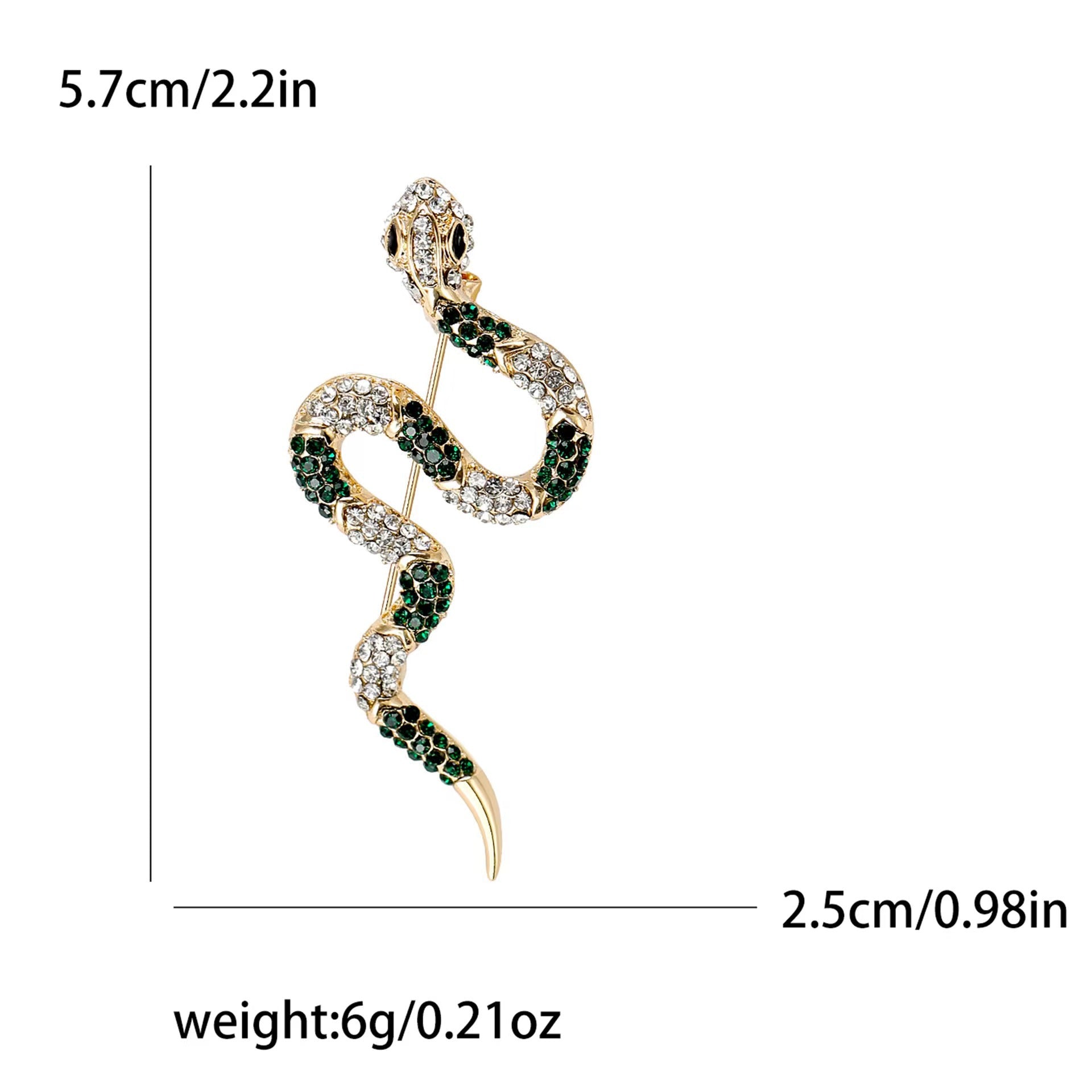 A gold snake brooch with green gemstone eyes and clear rhinestones on its body.