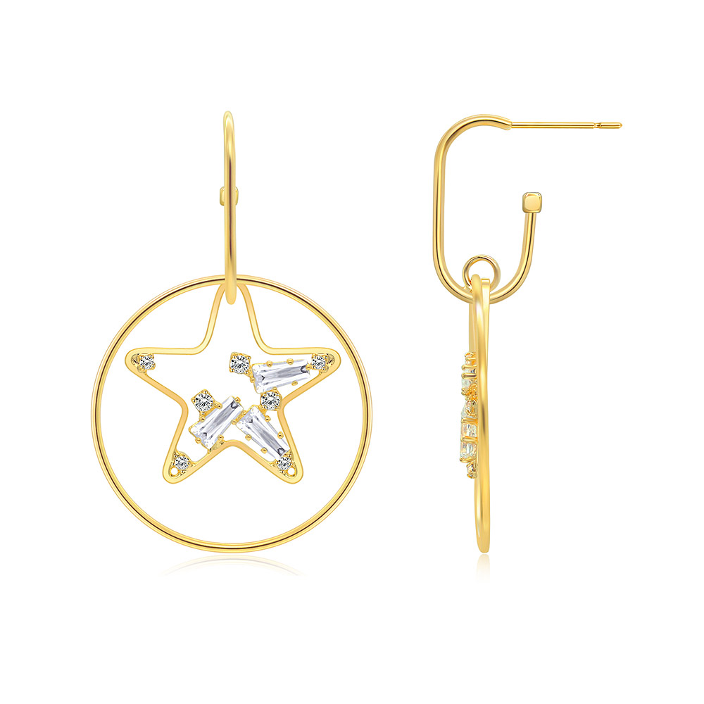 Detailed view of the gold star-shaped earrings with clear gemstones