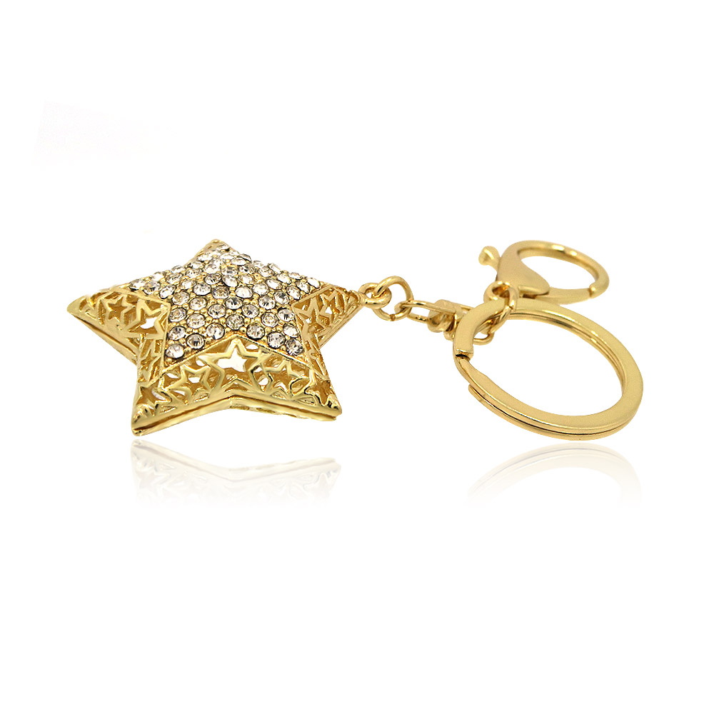 Detailed view of the intricate filigree design on the gold star keychain
