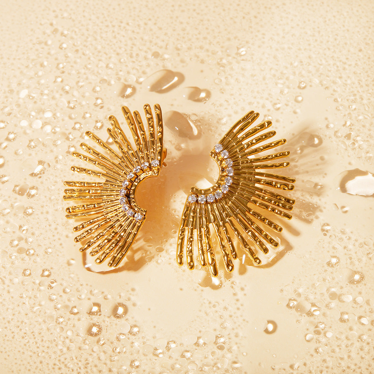 Detailed view of the sunflower earrings with clear stones