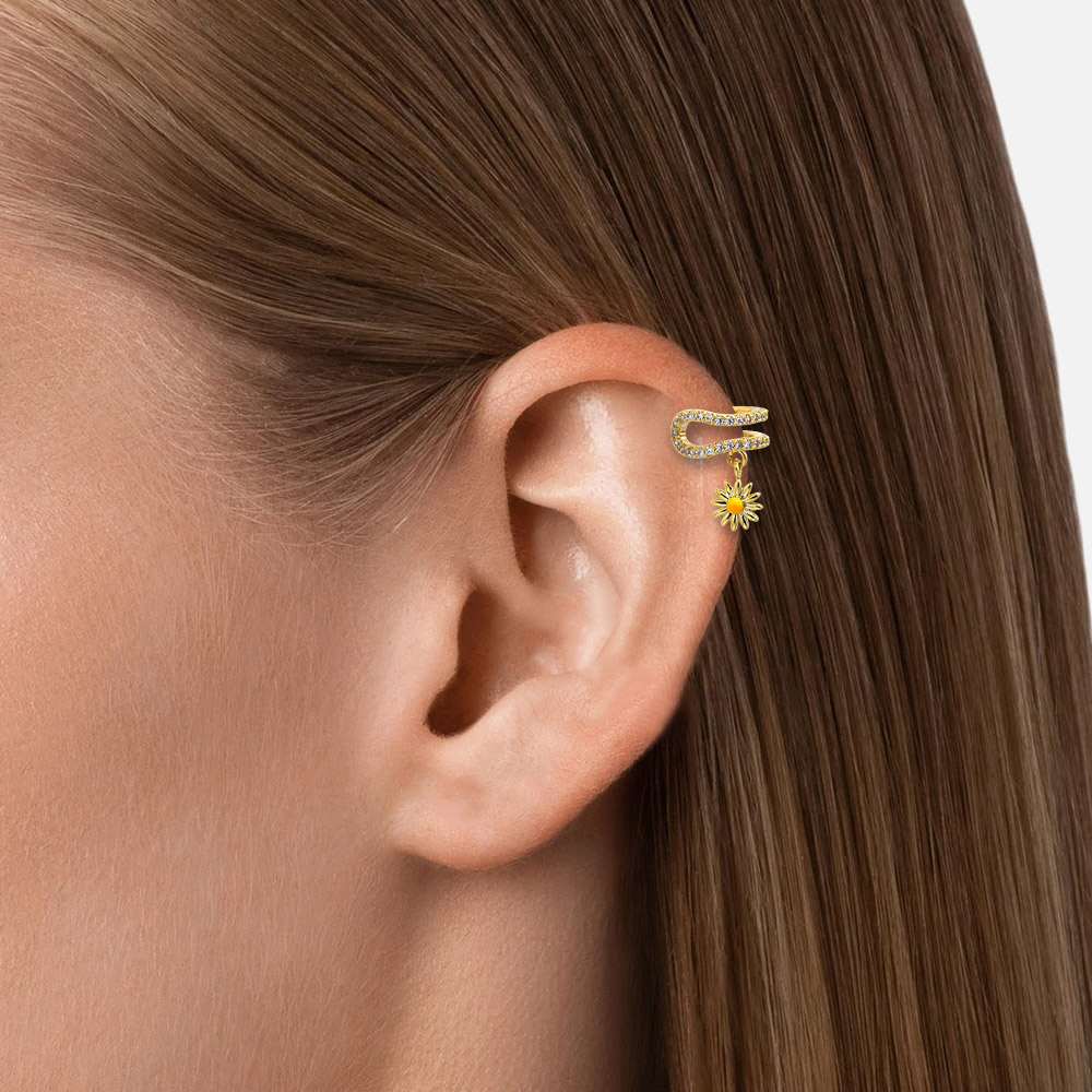 Model showcasing the Dangle Daisy Flower Minimalist Wrap earring.