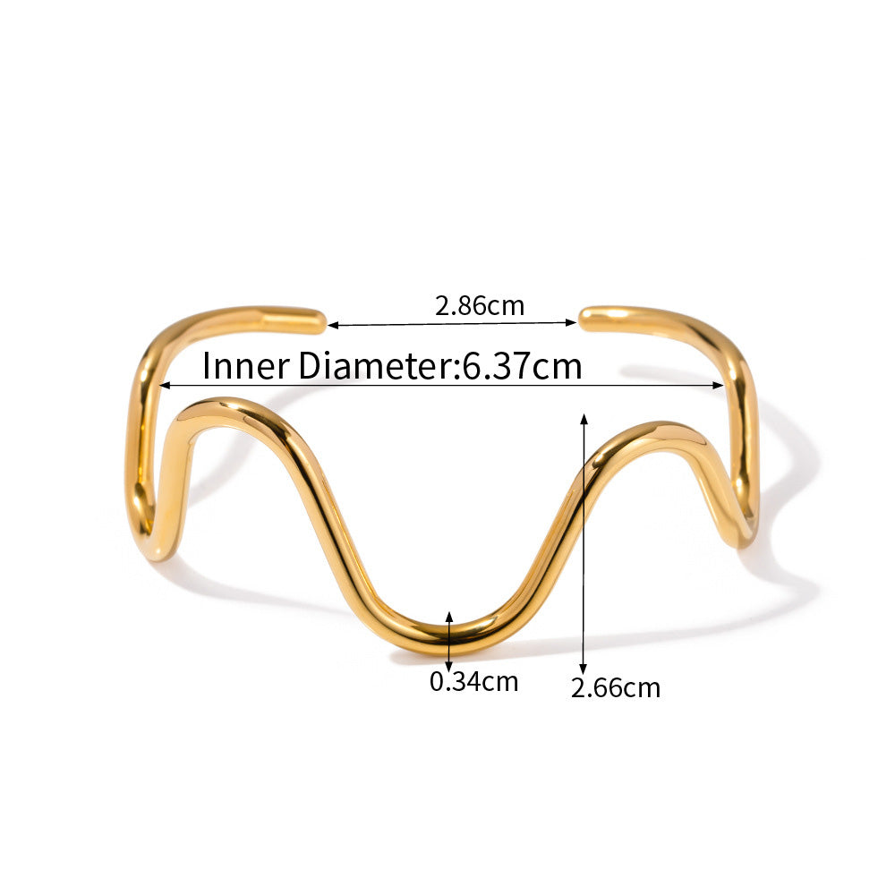 Detailed dimensions of the gold plated curve wave cuff bangle, showing inner diameter, width, and thickness.