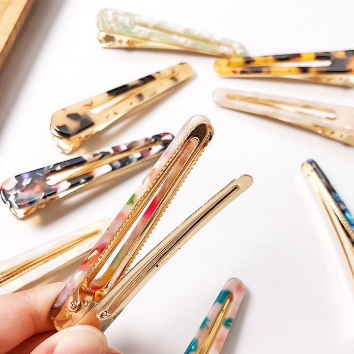 A variety of colorful acetate hair clips