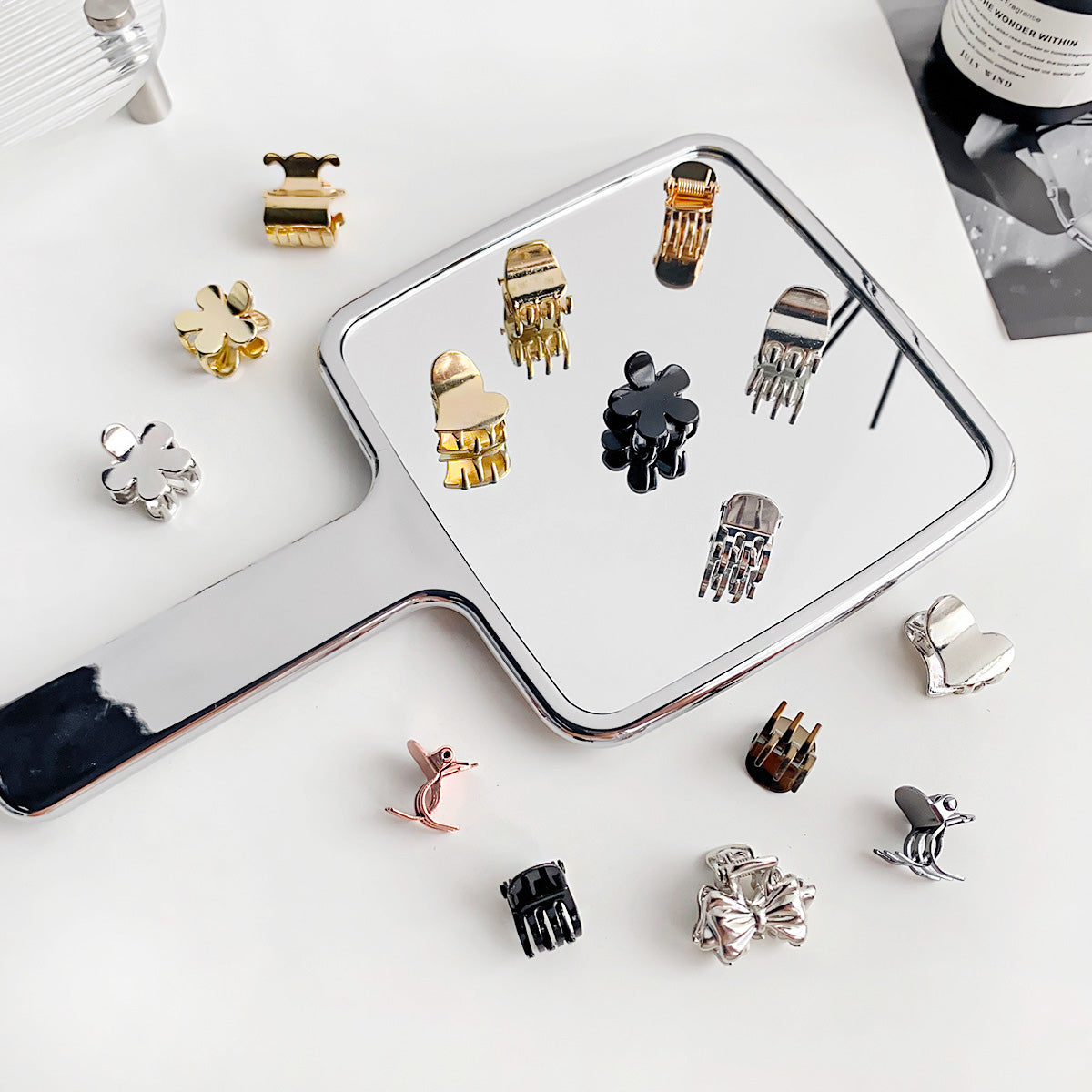 A variety of mini hair clips in different colors and styles