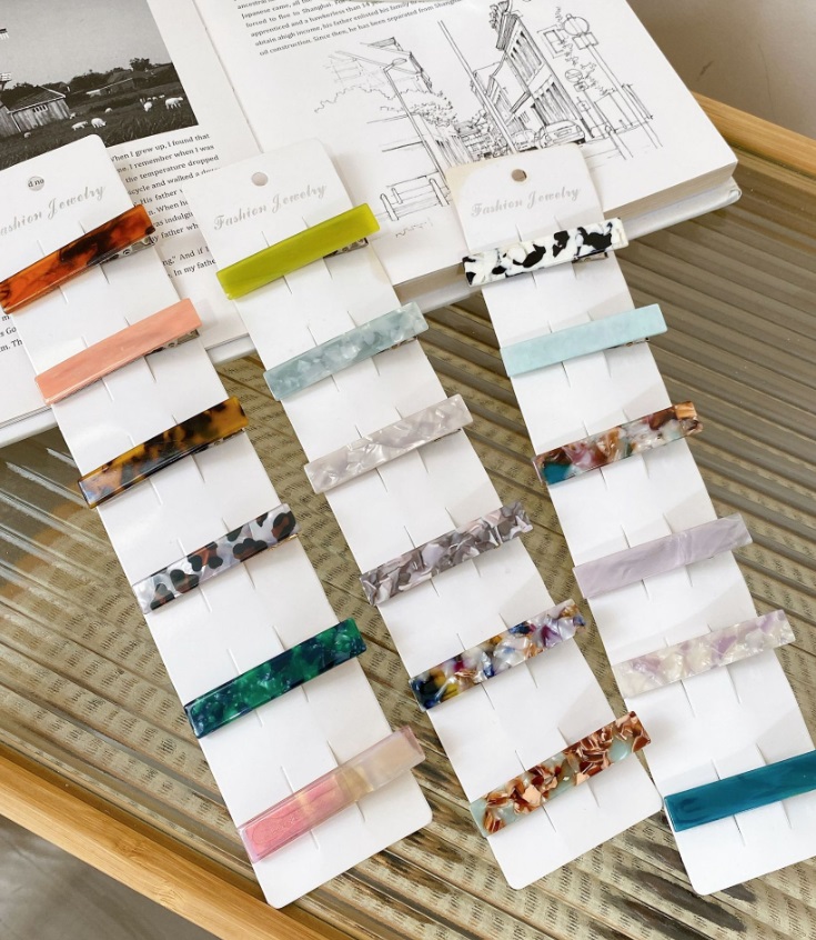 A collection of colorful acetate resin hair clips