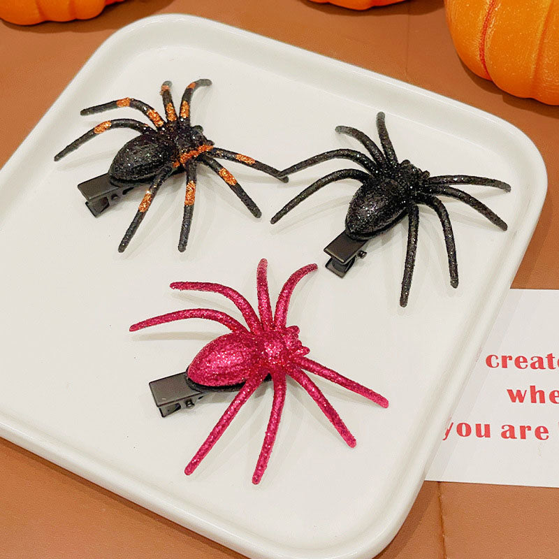 A collection of colorful Halloween spider hair clips