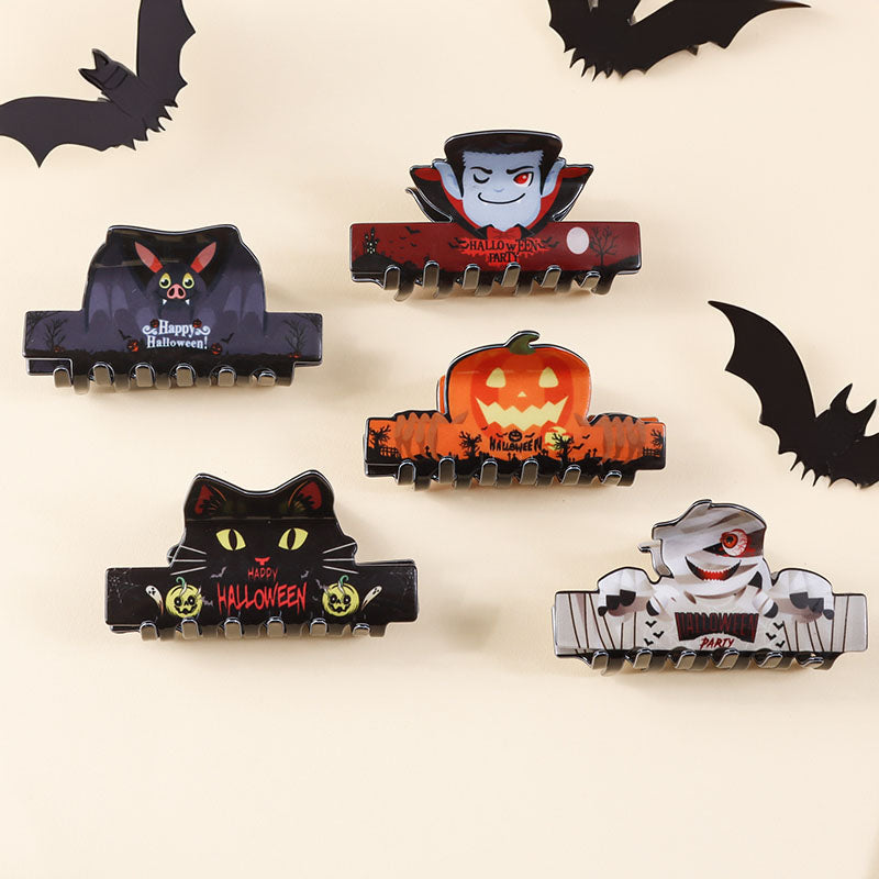A vibrant collection of Halloween hair clips with designs like ghosts, pumpkins, and bats.
