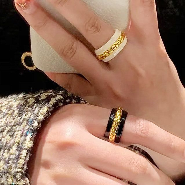 Model wearing the black and white vintage enamel rings.