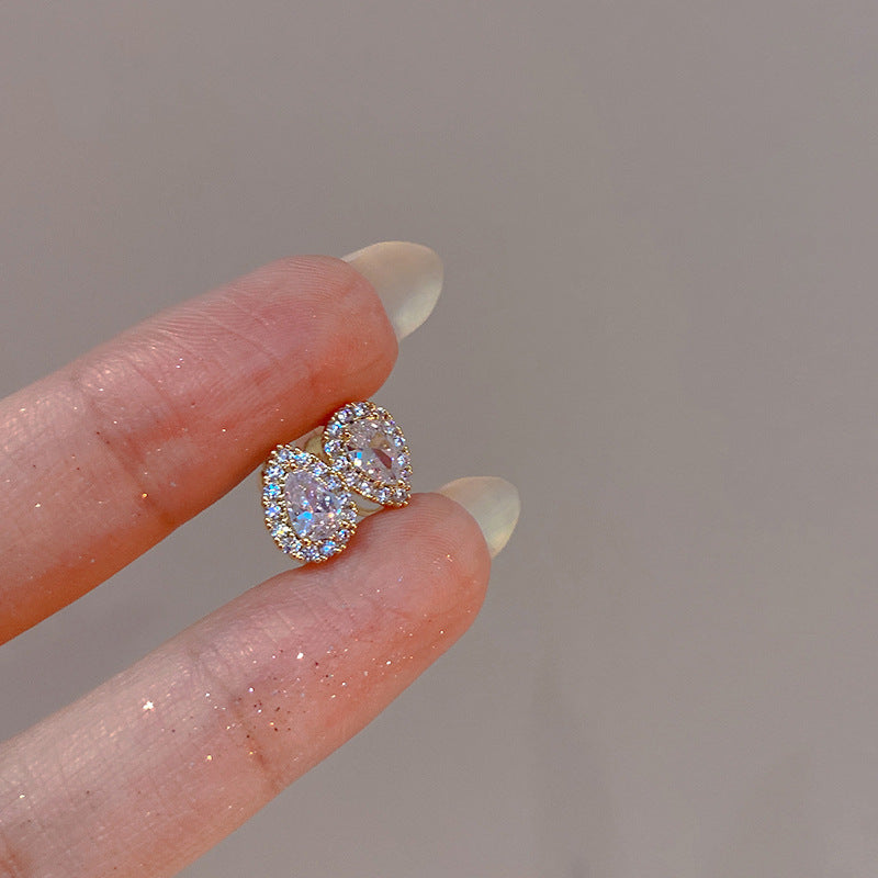 Heart-shaped earring with clear gemstone from the 5-pair set