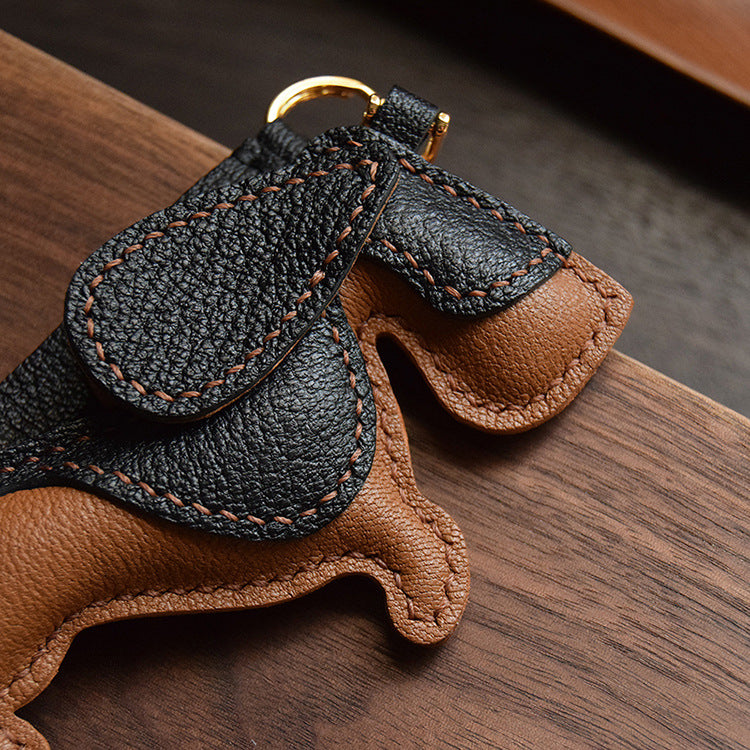 Detailed view of the 3D Basset Hound leather bag charm