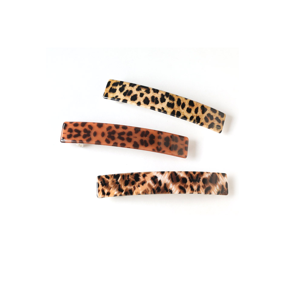 Detailed view of the Acetate Leopard Hairpin showing its vibrant pattern and glossy finish.