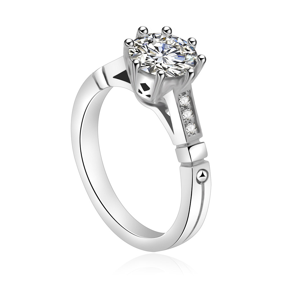 A detailed view of the White Round Shoulder Ring's brilliant cubic zirconia stone and rhodium-plated band.