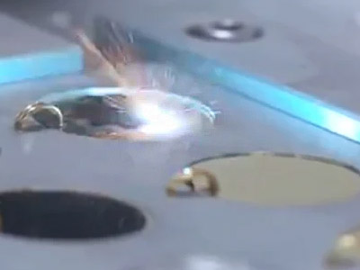 Close-up of laser engraving on a metallic surface