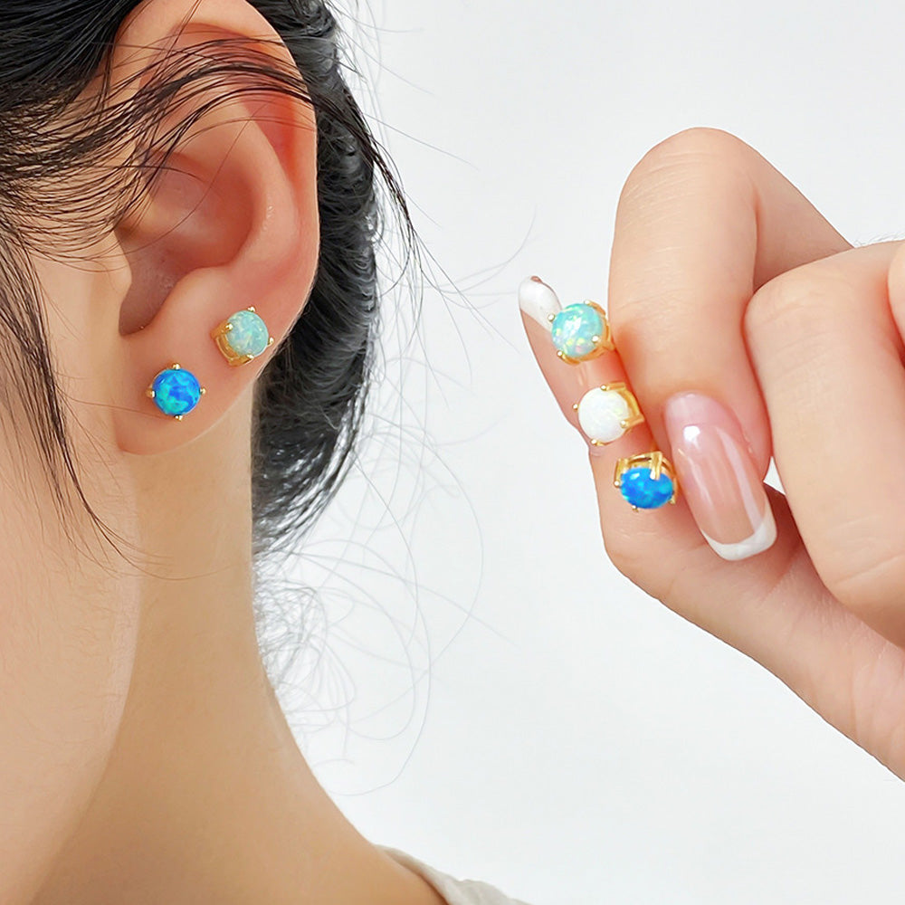 Model wearing the 925 Sterling Silver Opal Stud Earrings