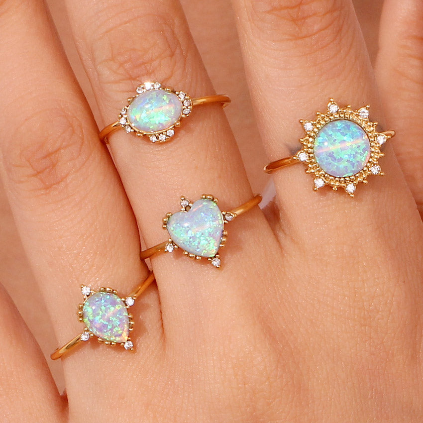 Four styles of adjustable stainless steel opal rings