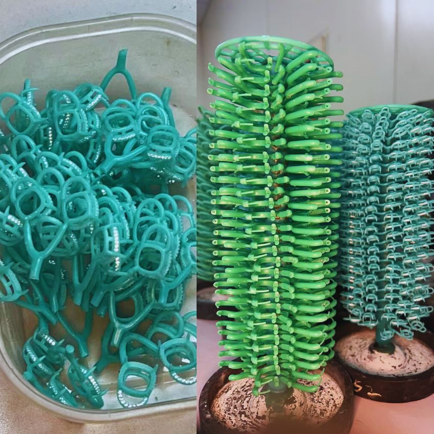 Specialized tools and teal-colored wax models for precision casting.