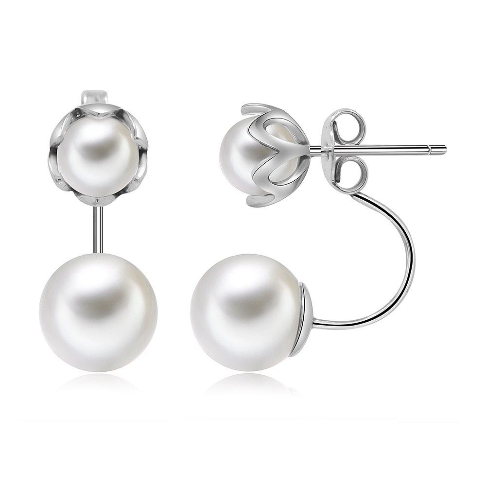 Multiple angles of the Double Shell Pearl Ear Studs