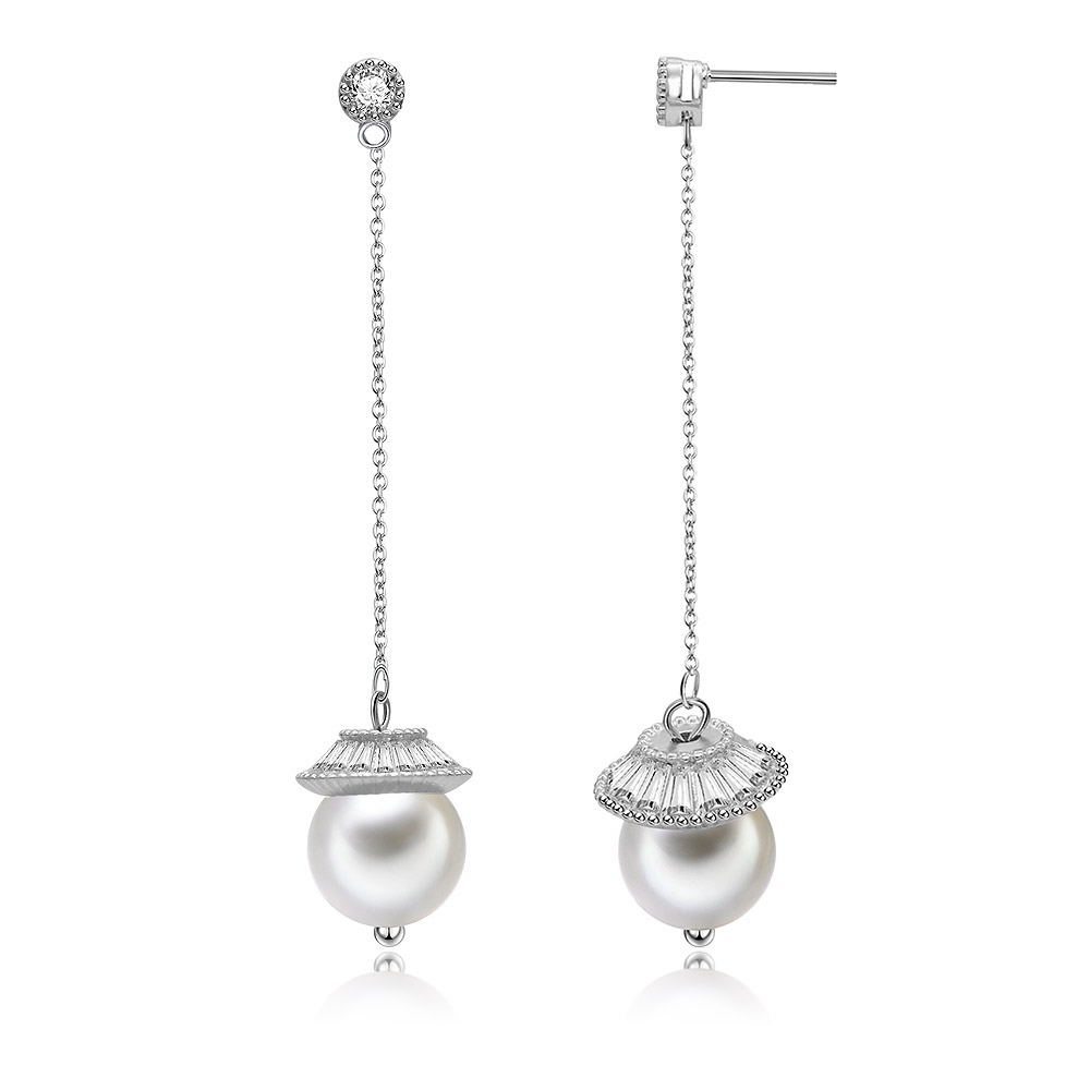 Detailed view of the Drop Of CZ Pearl Earrings with silver and crystal embellishments