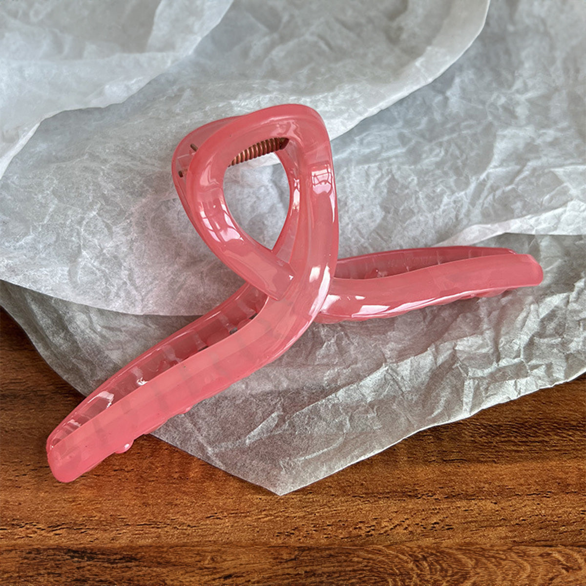 Close-up of the Pink Acetate Hair Jaw Clip showing its glossy finish and design.
