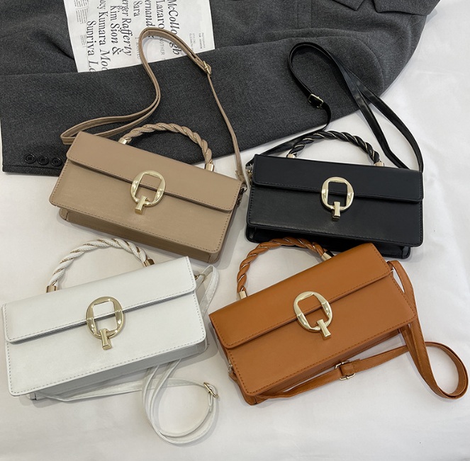 The Female Classic Retro Bag available in white, beige, brown, and black
