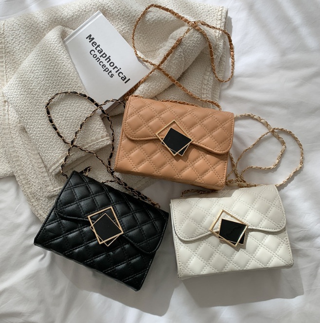 The Flap Bag Top Handle Crossbody Bag is available in multiple colors including black, beige, and white.