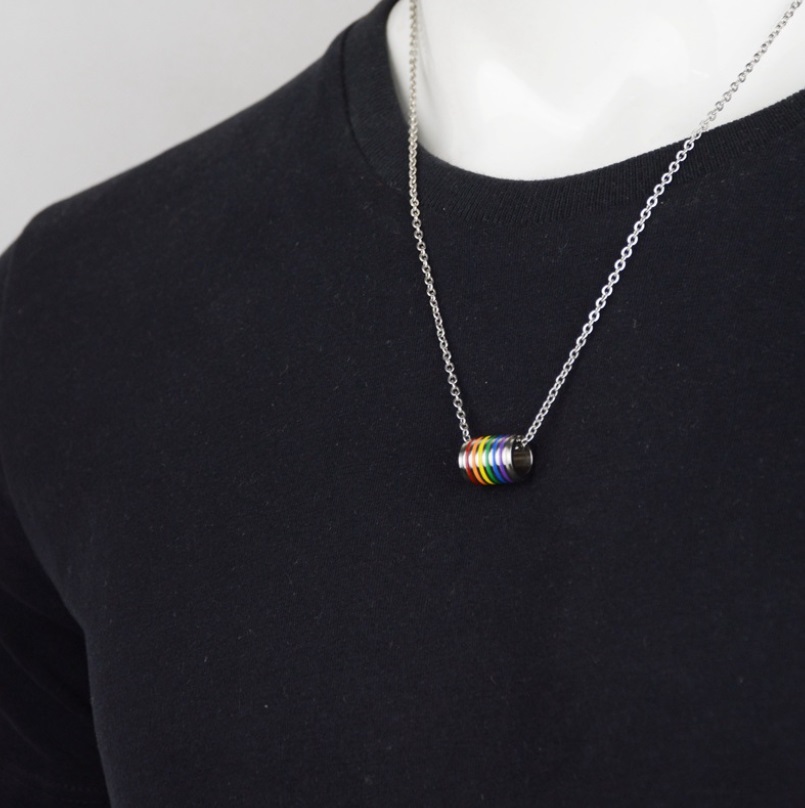 Product shot of the Rainbow Pride Enamel Tunnel Necklace against a white background